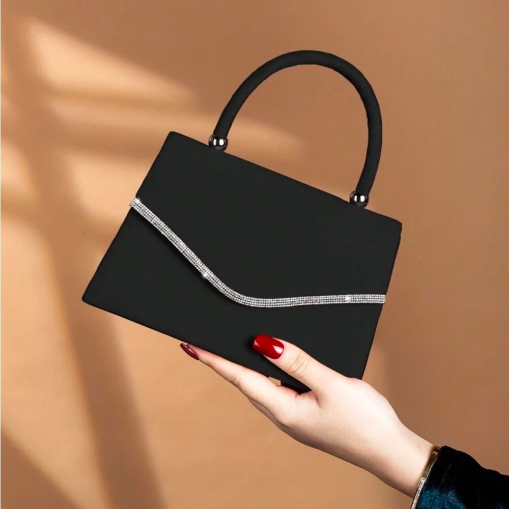 Sleek Black and Silver Mini Bag with Textured Finish